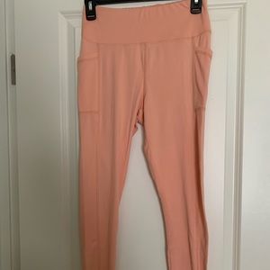 Thin lightweight light orange/peach workout leggings, size m